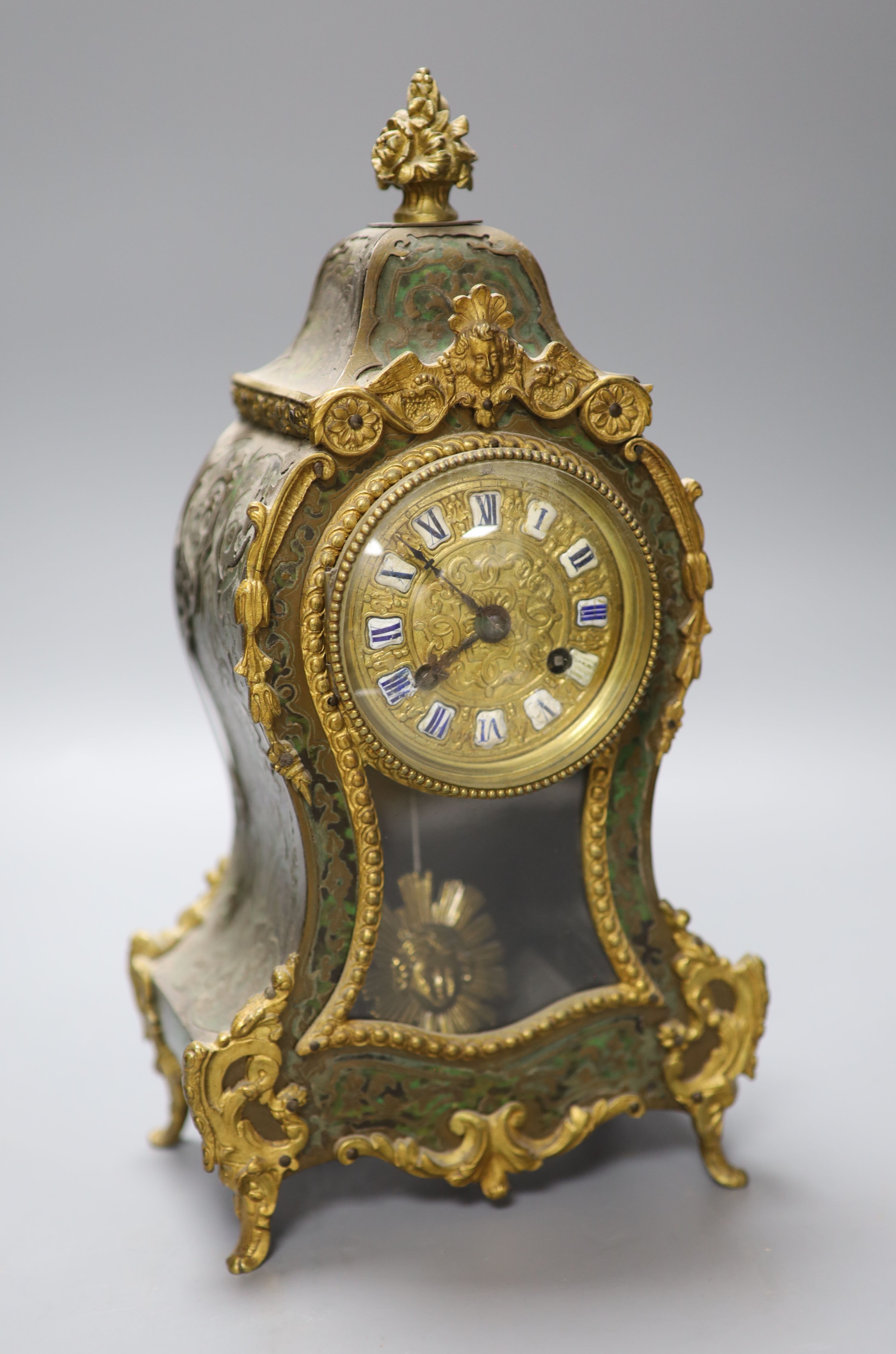 A 19th century French green boulle mantel clock, height 30cm
